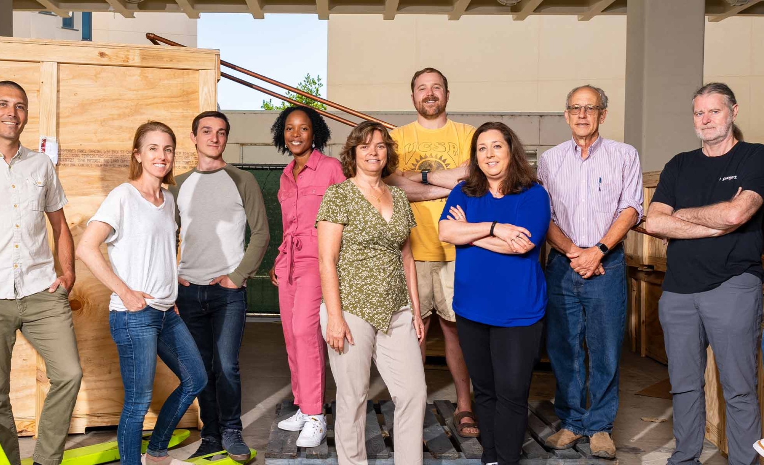 ExFab group photo in warehouse