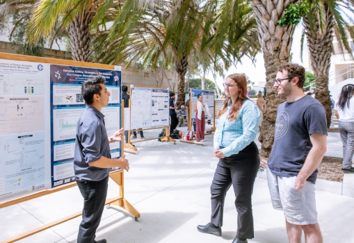 UC Santa Barbara chemical engineering major Jessy Gonzalez explains his summer research project during a poster session sponsored by the Center for Science and Engineering Partnerships (CSEP).