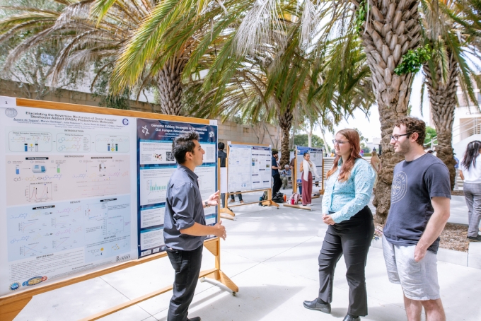 UC Santa Barbara chemical engineering major Jessy Gonzalez explains his summer research project during a poster session sponsored by the Center for Science and Engineering Partnerships (CSEP).