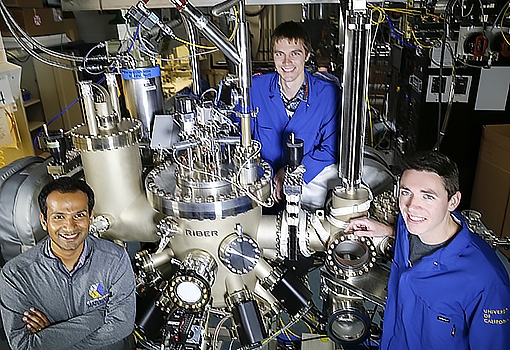 Kunal Mukherjee (lower left) with PhD students (from top) Brian Haidet and Eamonn Hughes in the MBE lab.