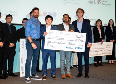 EyeClimate, the 2024 New Venture Competition Finals champions (left to right) Tim Arnold, NVC Finals judge; Bowen Zhang, PhD student; Max Gordon, undergraduate student; and Satish Kumar, PhD student